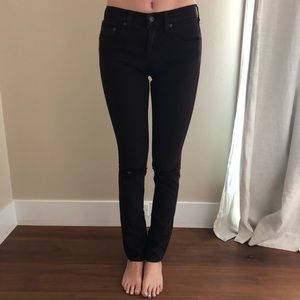 brown carmar jeans with rips at knees